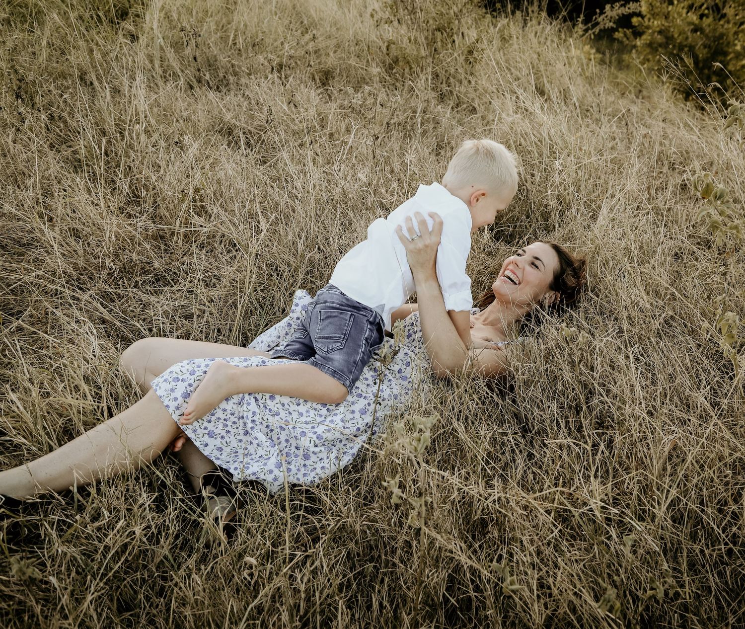 Tackling mum in the grass.