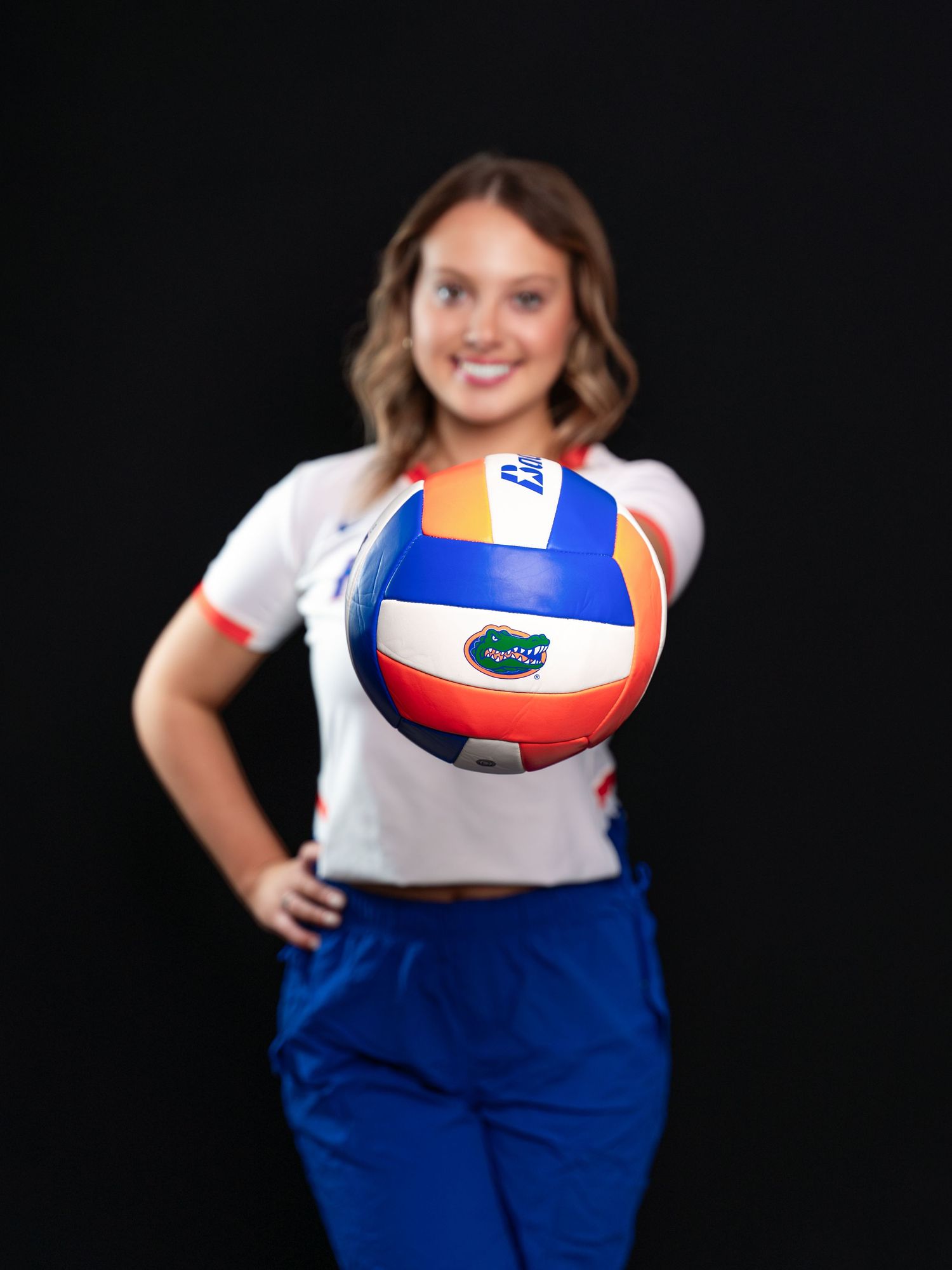 Photo of high school senior in a Gators volleyball uniform taken by East Tennessee sports photographer