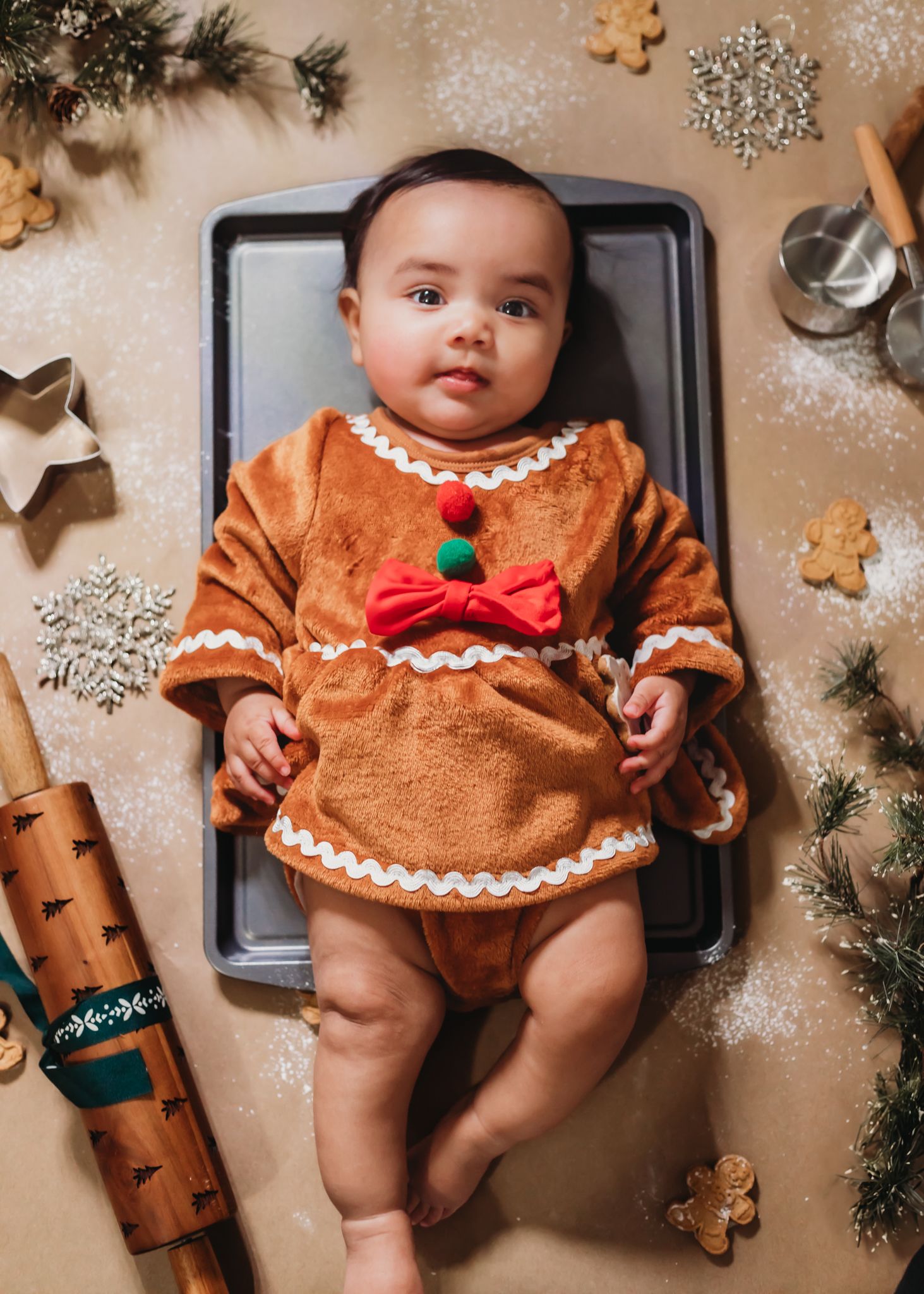themed shoot, baby dressed as gingerbread cookie for christmas