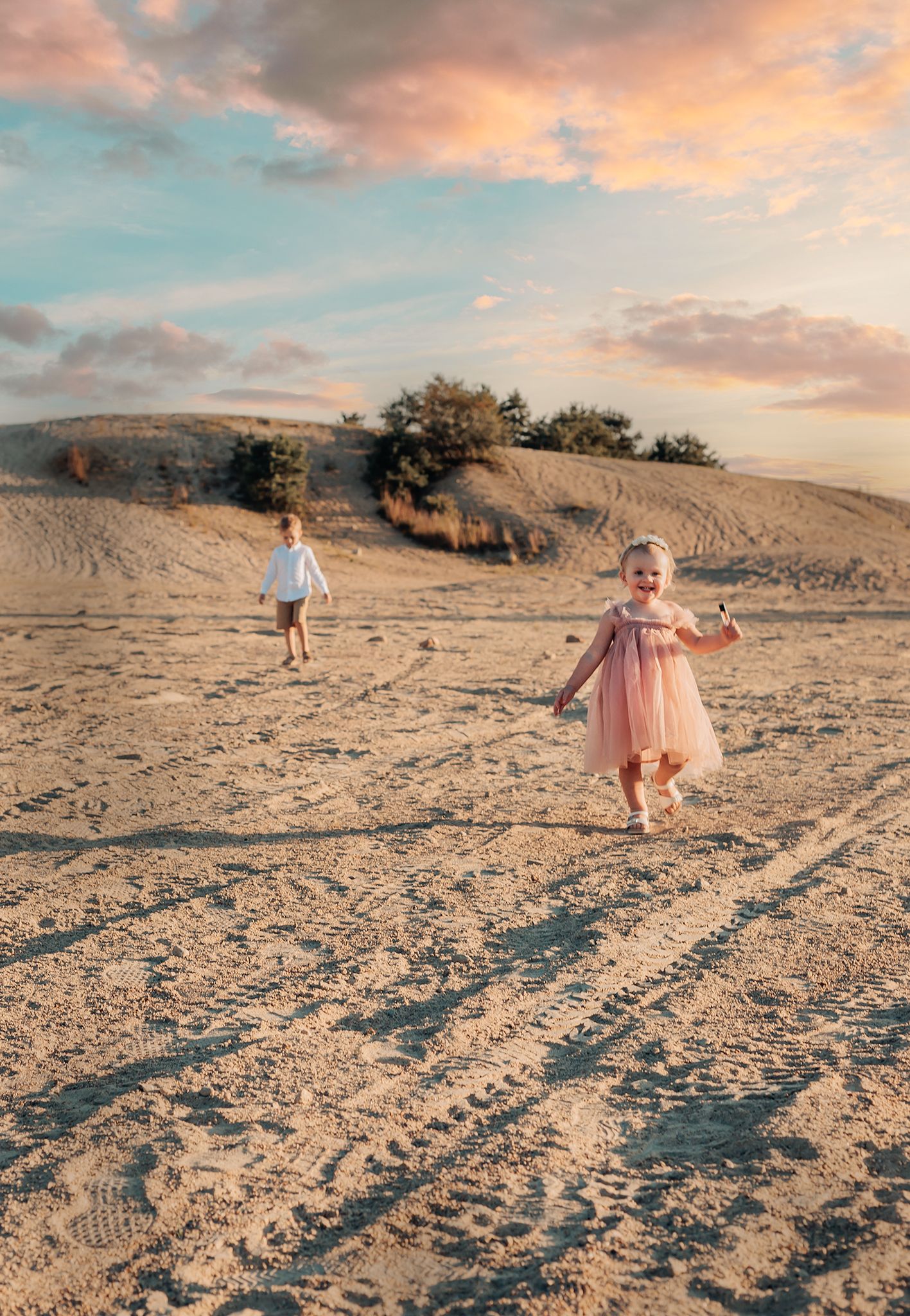 kids running in sand dunes in rhode island, happy, having fun, sunset, dramatic family photoshoot