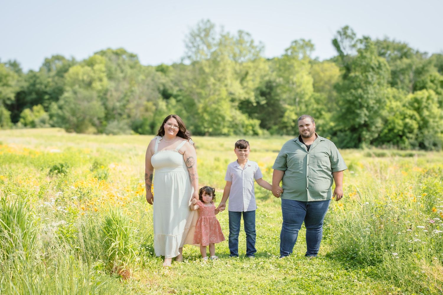 blended family outdoor session in Cincinnati wildflower field with luxury, professional styling for high-end clientele