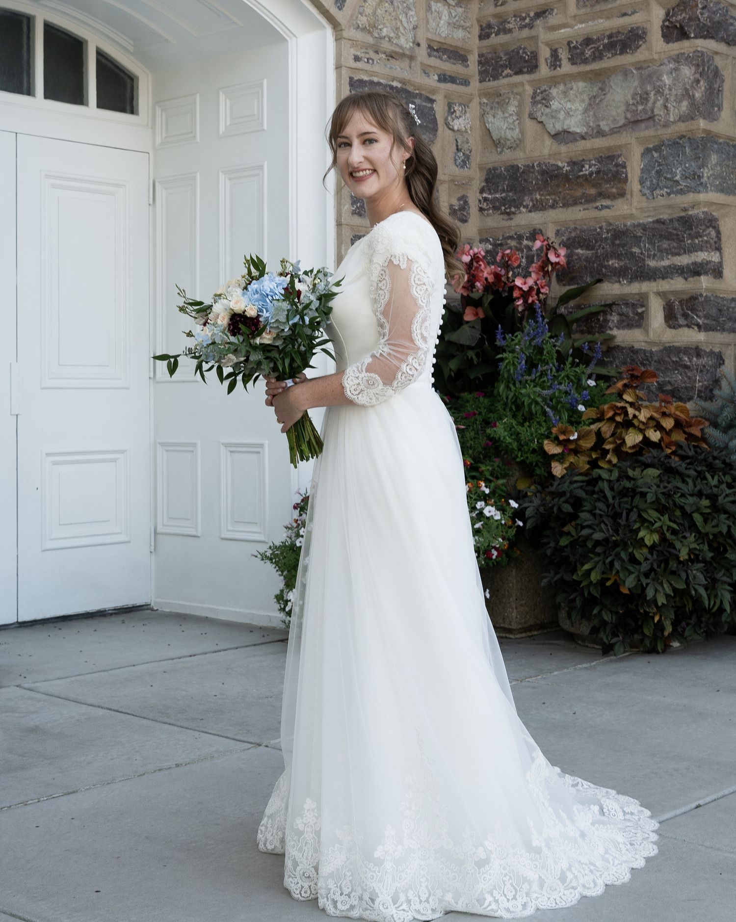 Beautiful bride in white wedding dress in Logan Utah temple