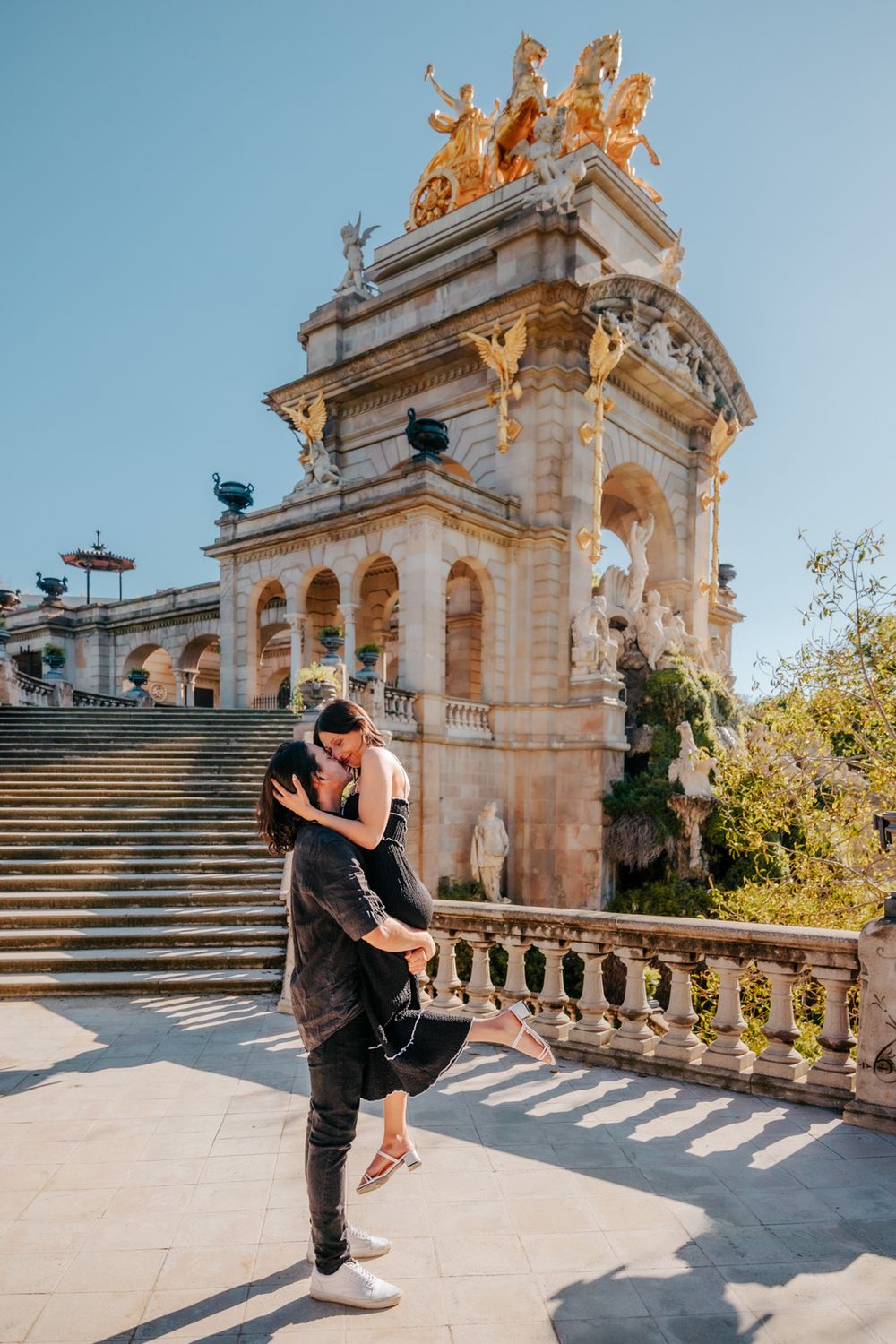 Romantic portrait framed by Ciutadella Park’s golden morning glow.