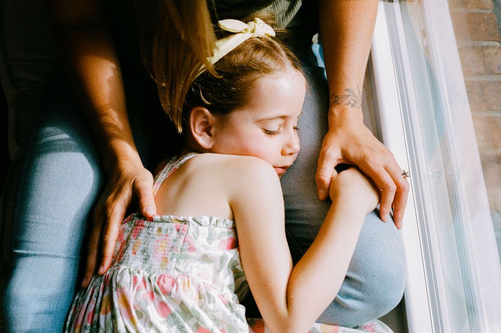 Tender close-up shots showing gentle moments and soft touches at home.