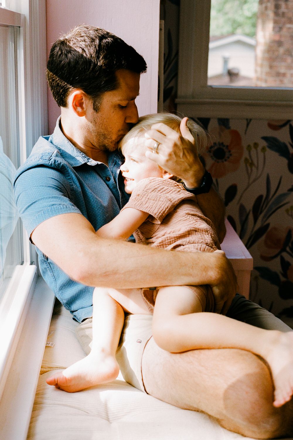 Intimate photo series showing a couple sharing tender moments by the window.