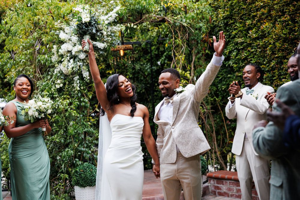 Wedding celebration as bride and groom are announced during ceremony at Chapel of Orange.