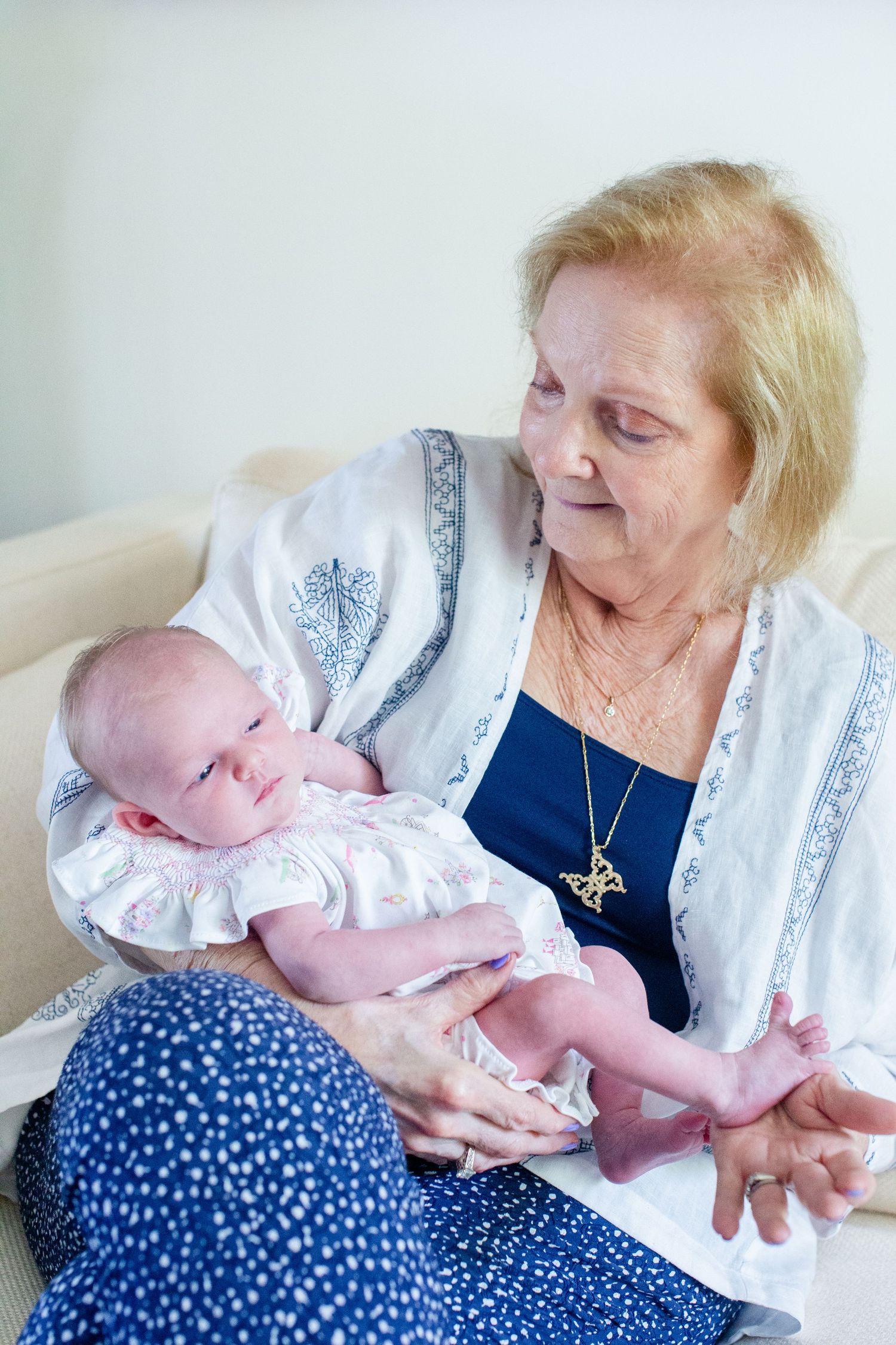 Newborn portrait. Great grandmother and baby. Guaynabo, Puerto Rico.
