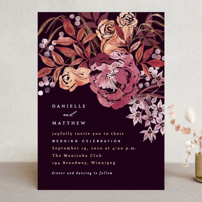 Elegant wedding invitation set in blush and burgundy tones featuring floral designs and romantic calligraphy.