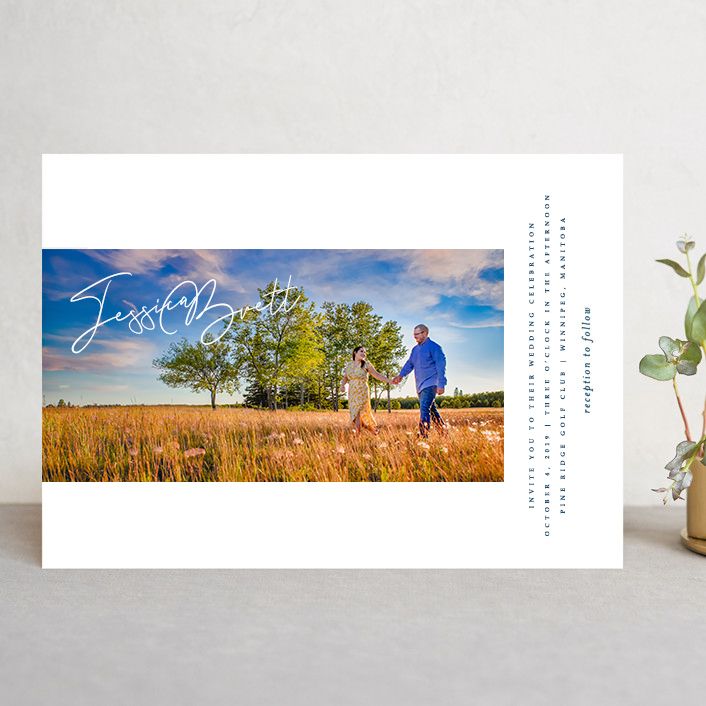 Panoramic landscape collage featuring golden wheat fields and blue sky with artistic text overlay and decorative elements.