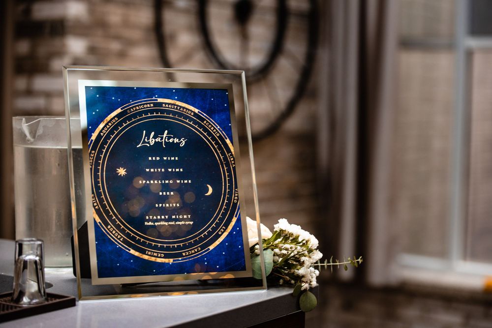 A trio of blue and gold round boxes labeled Lazy Susan arranged in retail display setting at a furniture store.