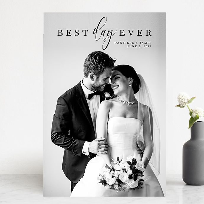 Black and white wedding photos arranged in romantic minimalist composition showing intimate moments and floral details.