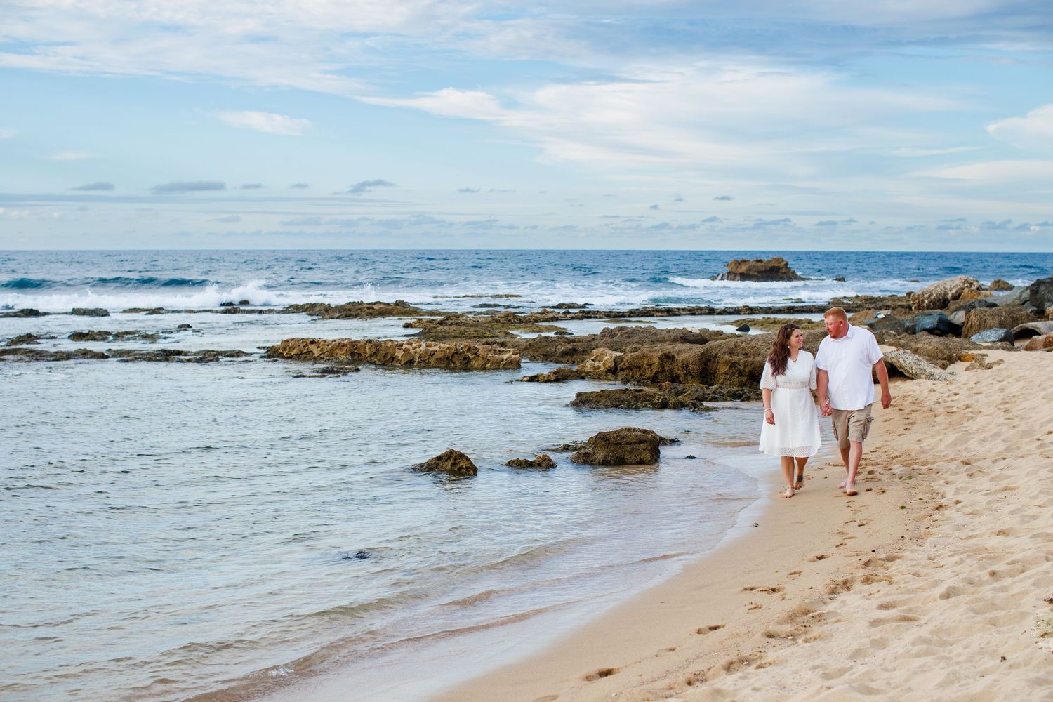 Elopement on the beach at Balneario del Escambrón in Old San Juan, Puerto Rico. Couples portrait - bride and groom.