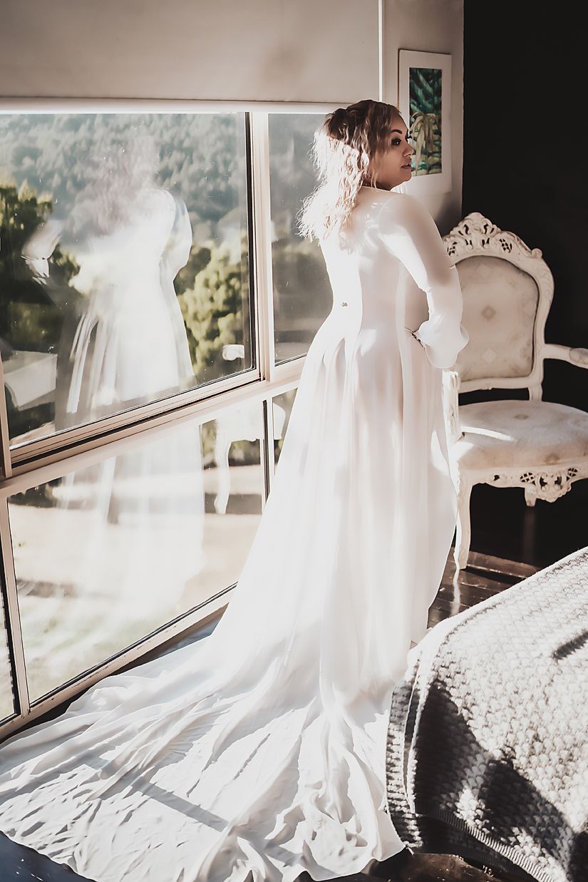 A series of ethereal bridal photos showing flowing white wedding dress details through window light.