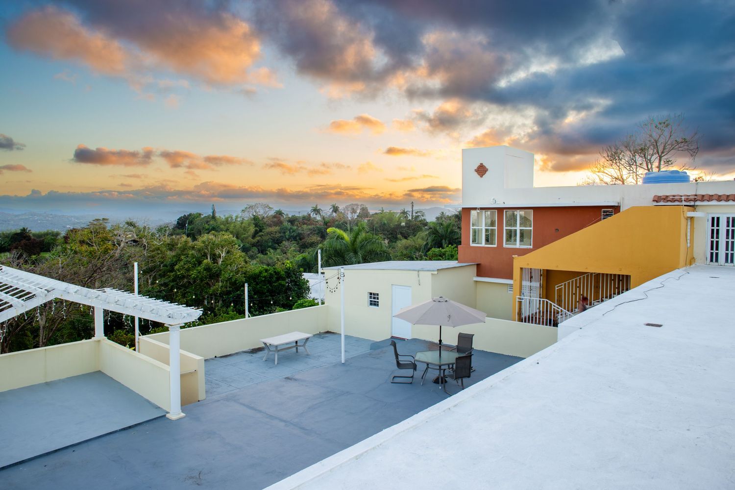 Real estate photo for a short-term rental in Aguas Buenas, Puerto Rico. Patio area / view.