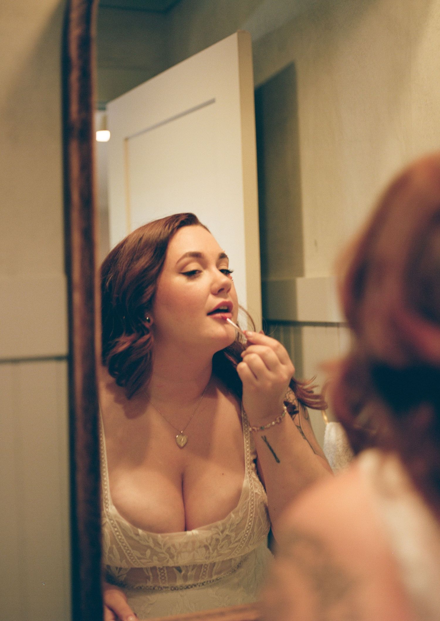A series of getting ready photos showing makeup application in warm lighting.