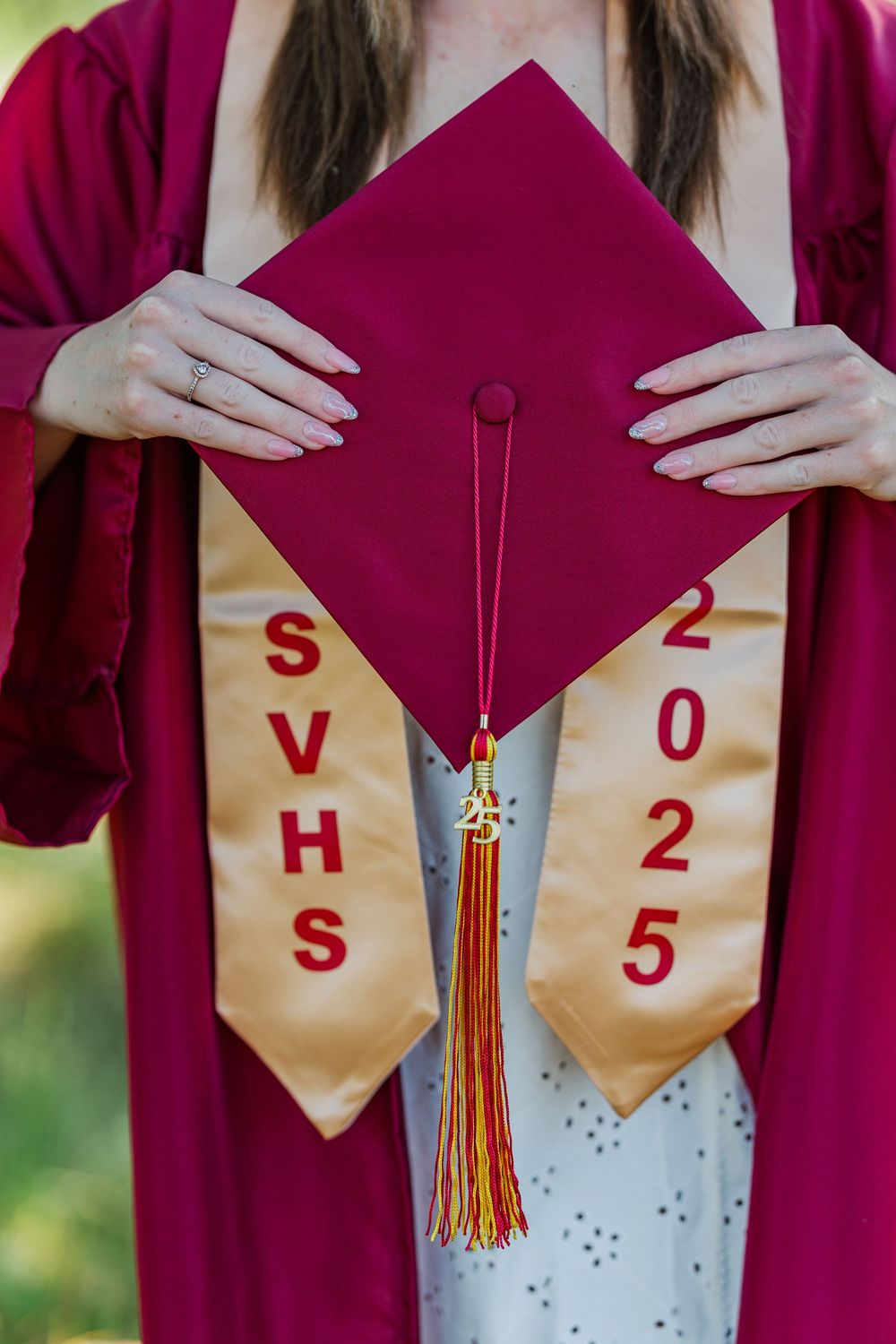 Simi High School twins posing in the hills of Simi Valley for outdoor graduation portraits, celebrating lacrosse and college milestones.