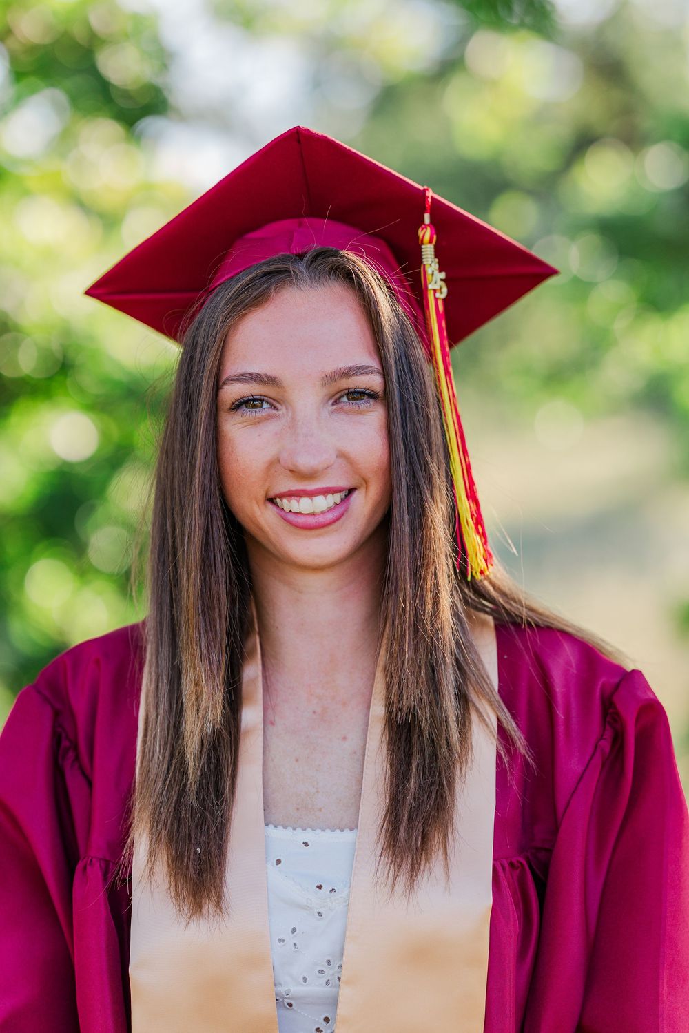 Simi High School twins posing in the hills of Simi Valley for outdoor graduation portraits, celebrating lacrosse and college milestones.