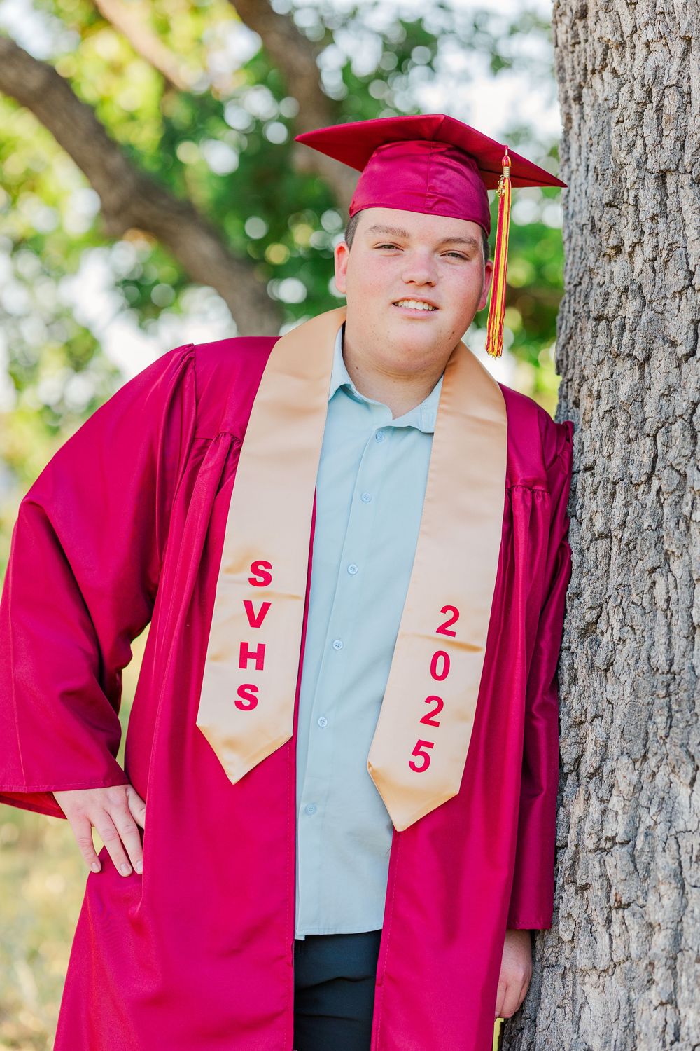 Simi High School twins posing in the hills of Simi Valley for outdoor graduation portraits, celebrating lacrosse and college milestones.