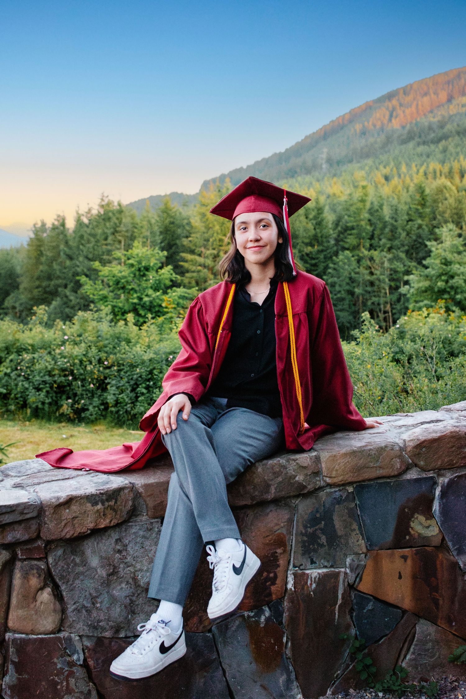Seattle and Tacoma graduation photography session at Snoqualmie Point Park in cap and gown.