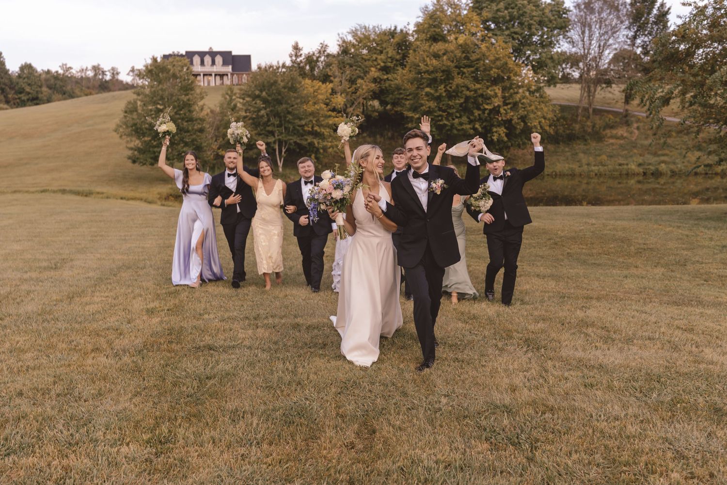 Wedding party celebrating the newlyweds at Willow and Stone Events in Mocksville, NC