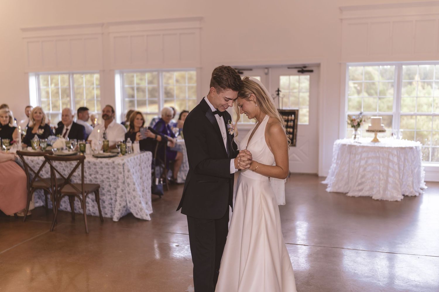 Newlyweds having their first dance at the wedding reception at Willow and Stone Events in Mocksville, NC