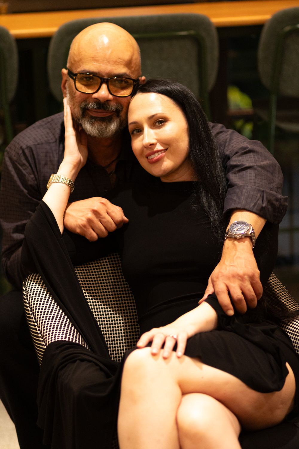 A series of intimate couple photos showing affectionate moments in casual black attire.