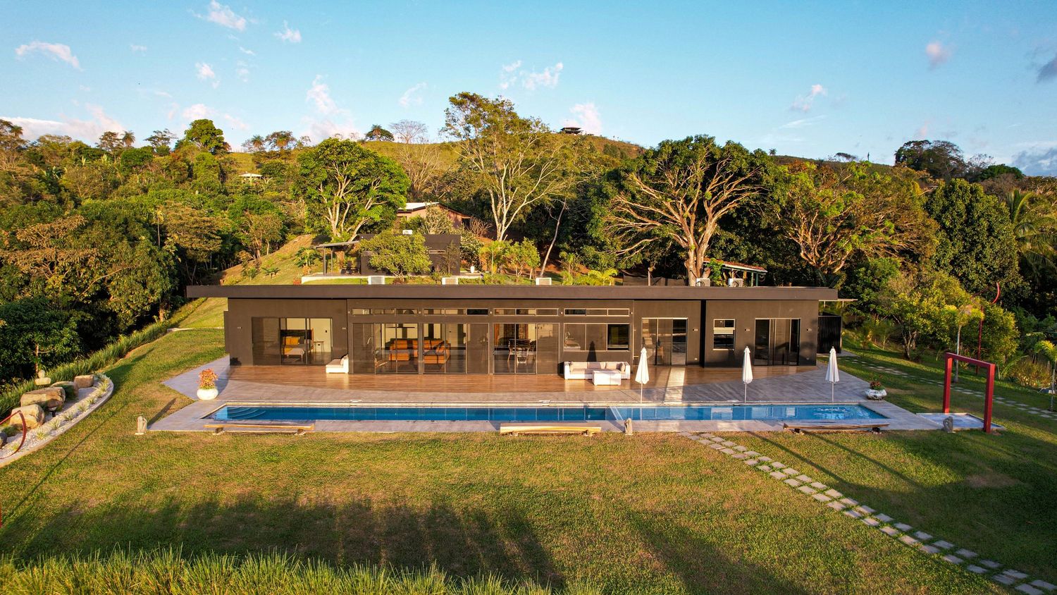 Luxury modern home with infinity pool, panoramic mountain and ocean views in San Mateo, Costa Rica.