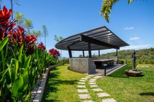Decorative sculpture in the landscaped garden with mountain views