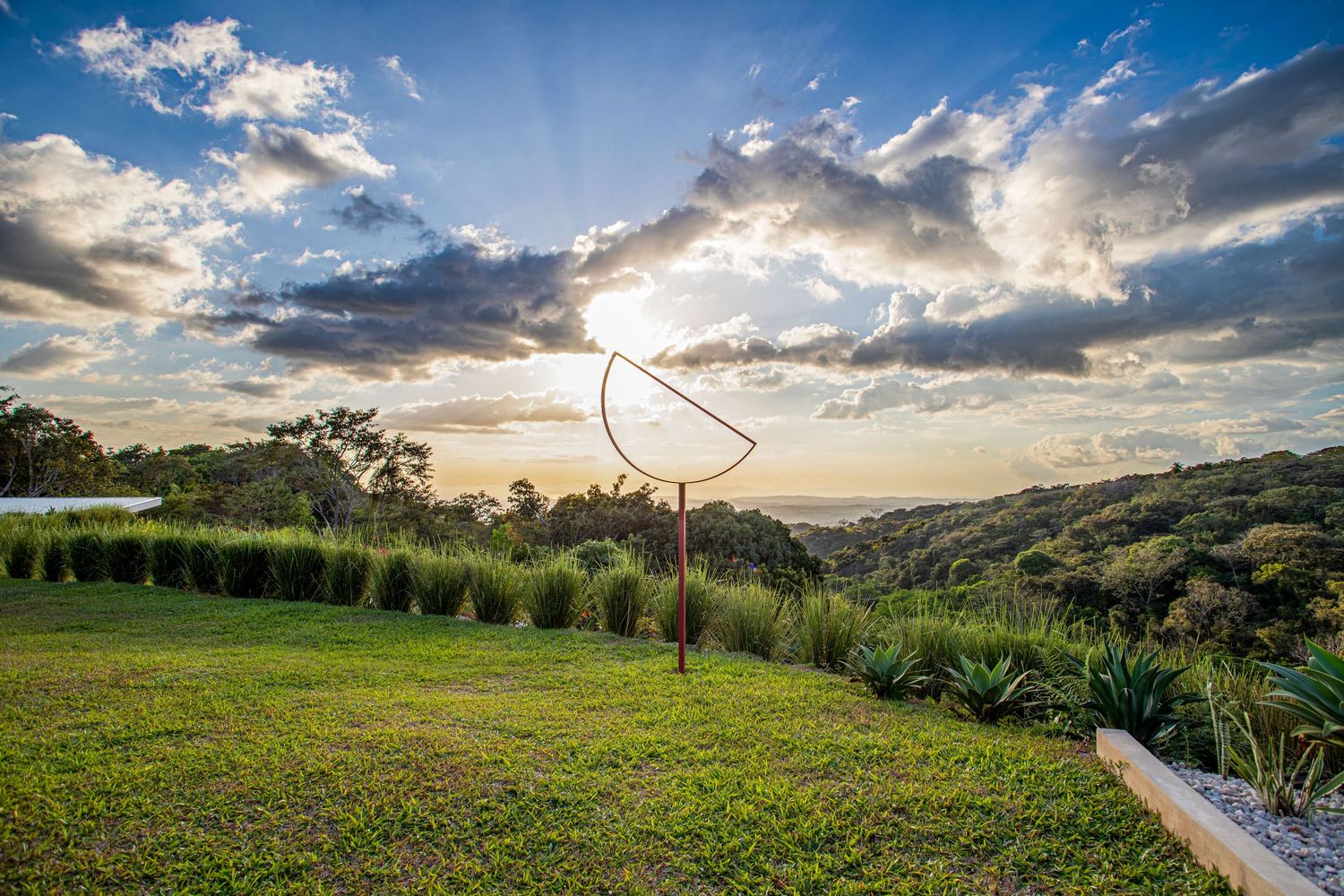 Serene meditation spot with a Buddha statue and lush greenery