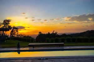 Luxury estate blending industrial, contemporary, and Hindu-inspired architectural elements