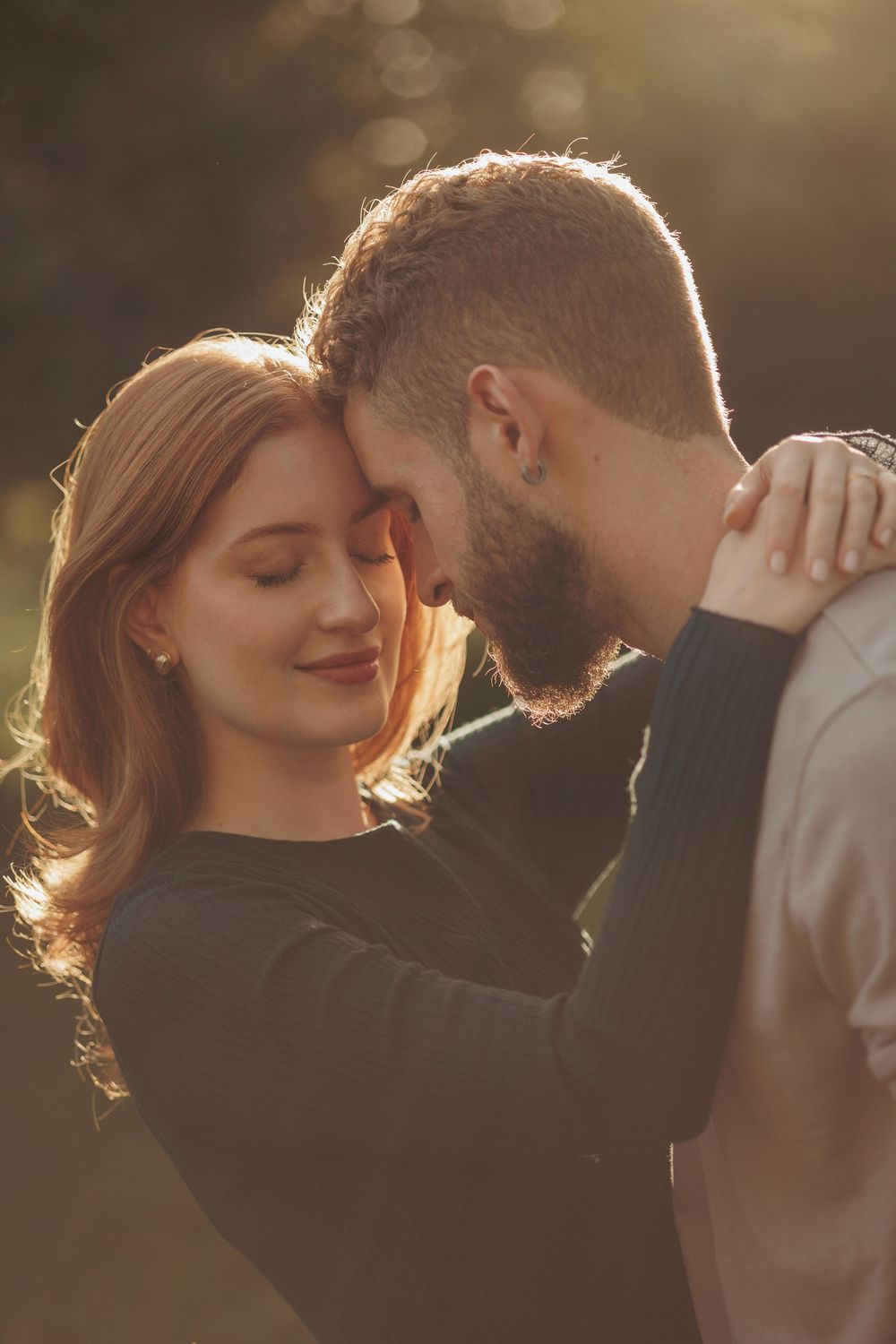 Romantic couple in golden sunlight sharing intimate moments in a series of close-up shots.