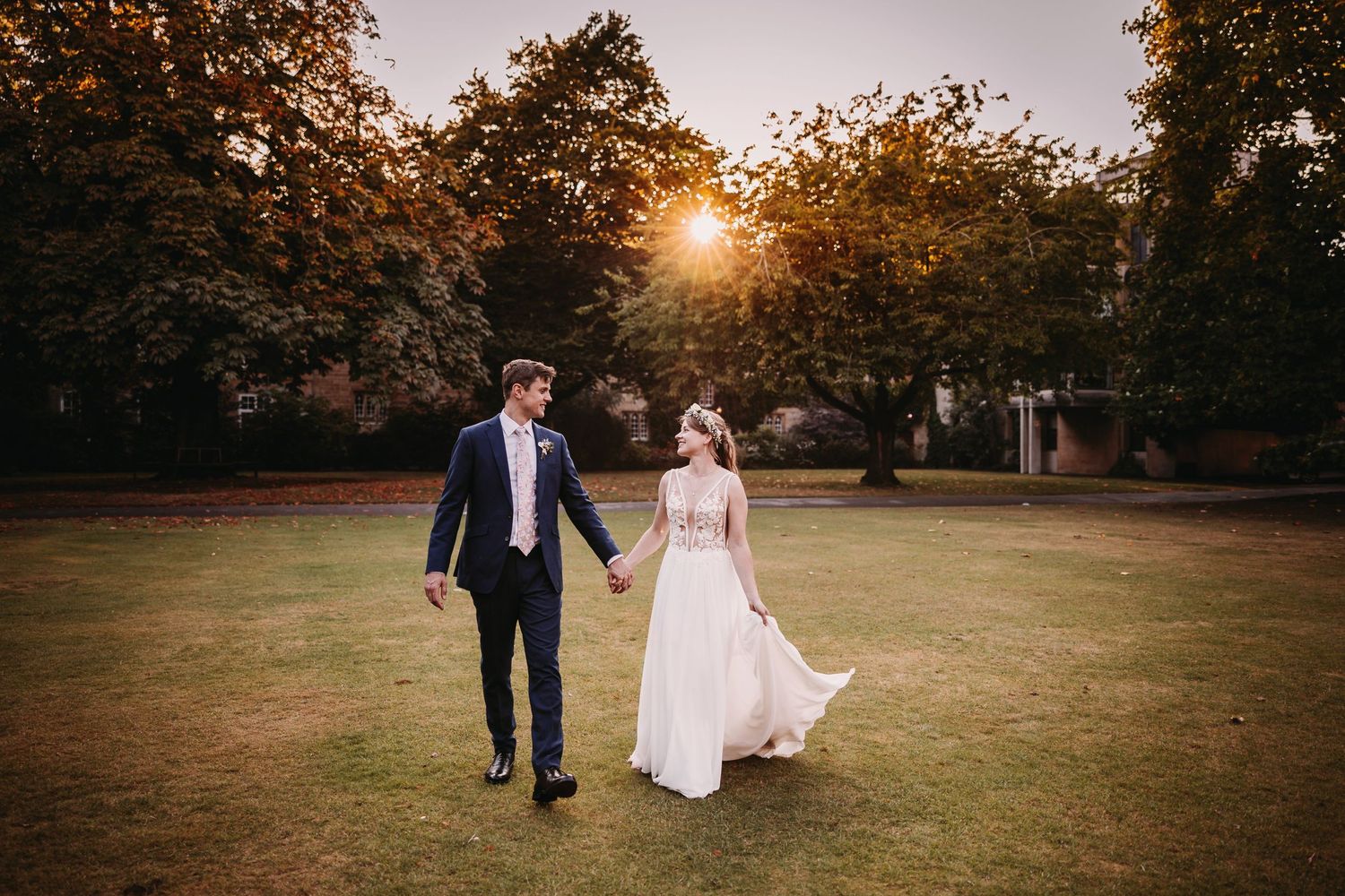 Balliol College, Oxford Wedding Photographer Vicky Lewis newly weds walking in golden sunset golden hour