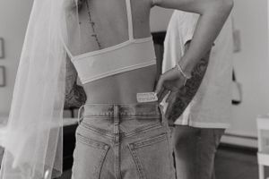 Black and white photo showing wedding preparation details.