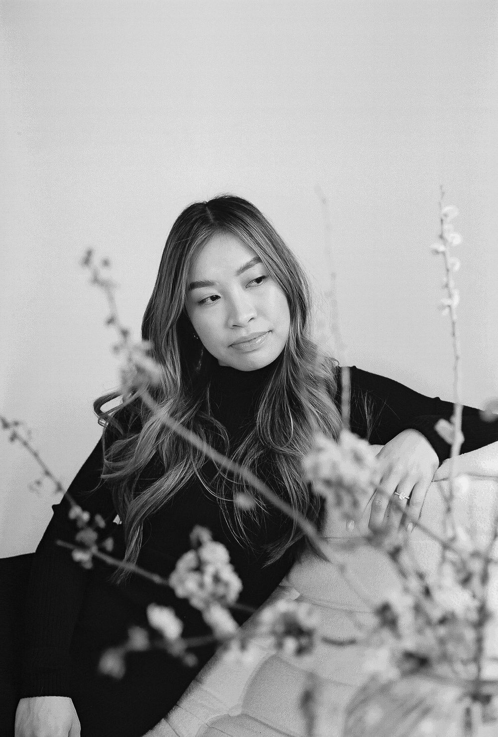 Artistic black and white series incorporating flowering branches and natural expressions.