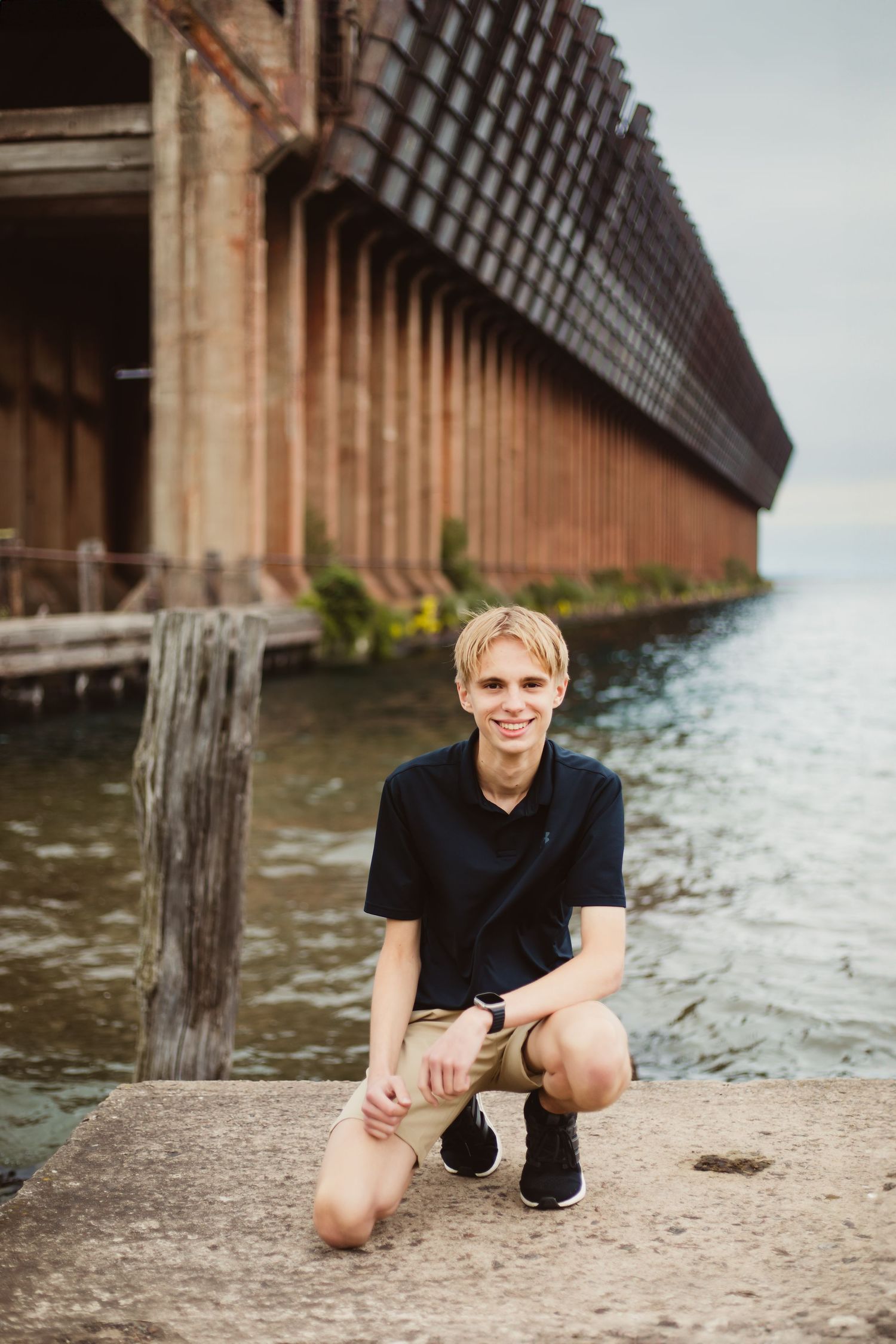 High school senior photo, guy, Ore Dock, Lake Superior, Marquette, Michigan.
