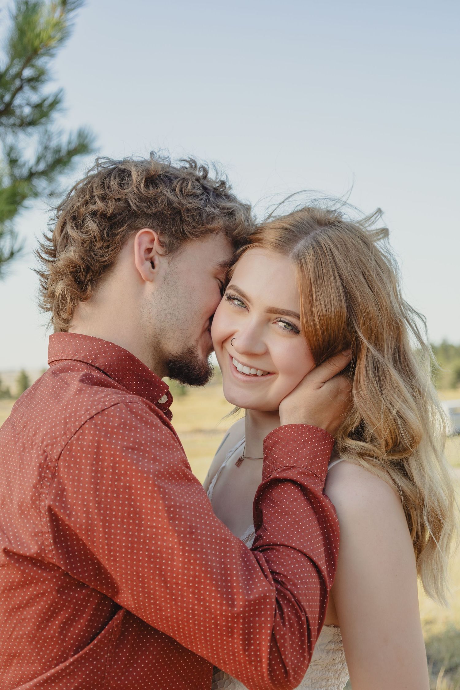Joey and Trinity share a heartfelt moment, glowing with love and connection in a beautifully captured couples portrait session.
