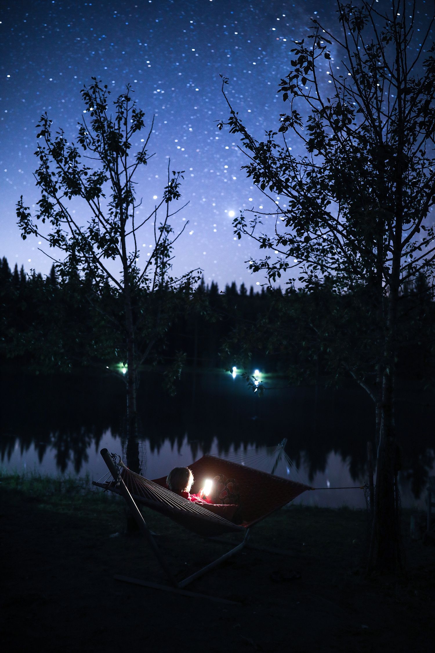 guest enjoys the stars on a hammock at watervalley airbnb glamping resort tranquility glamping base