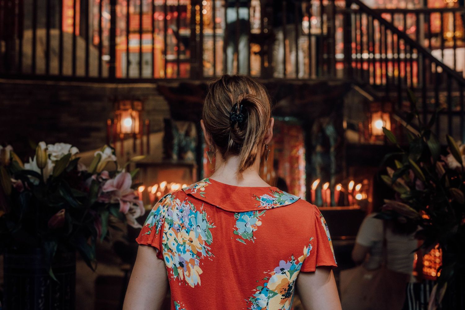 Western woman standing in a Taoist temple