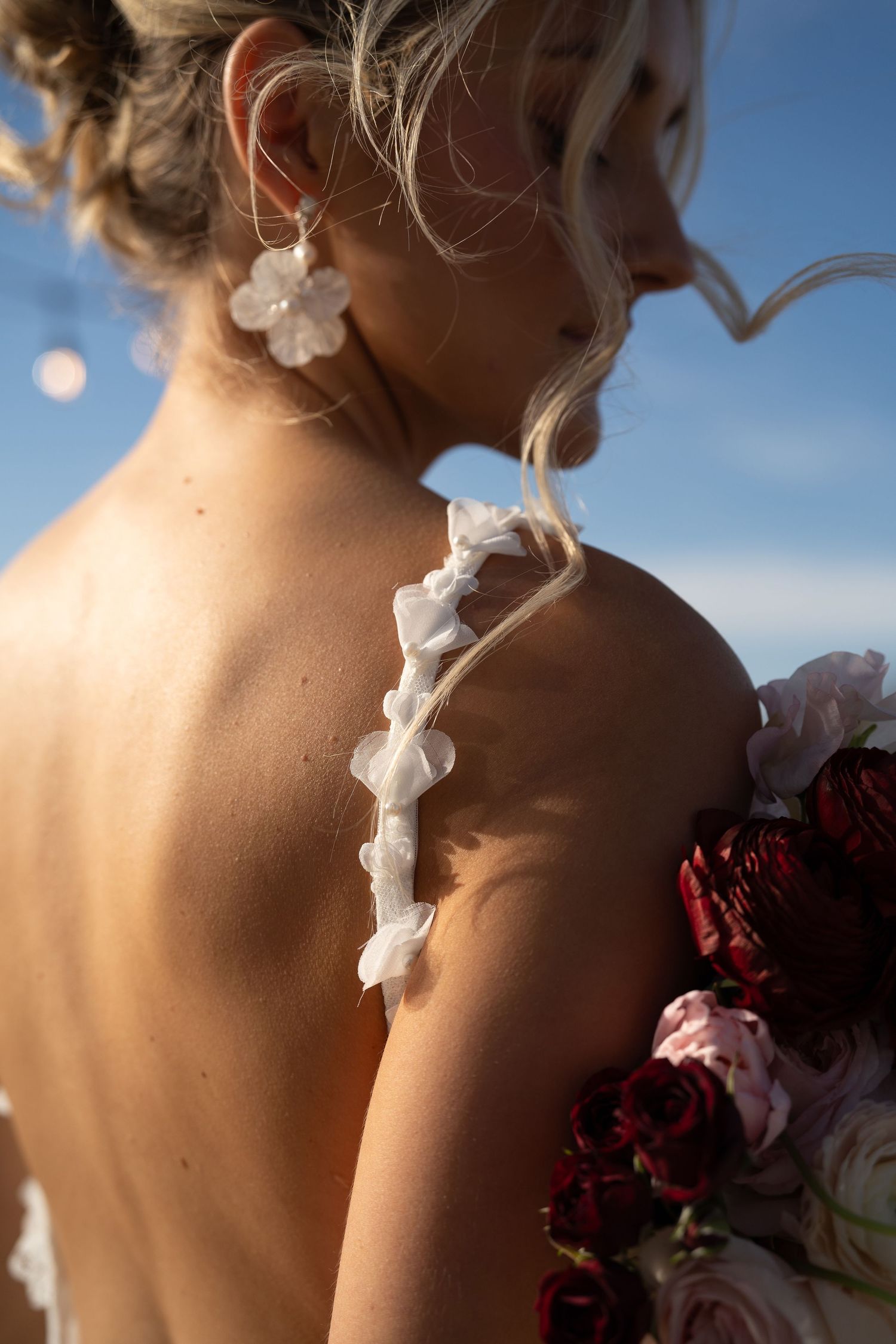 Editorial bridal portraits at Silver Spoon Barn at Emerald Event Center in Joplin, MO focused on intimate details with harsh sun