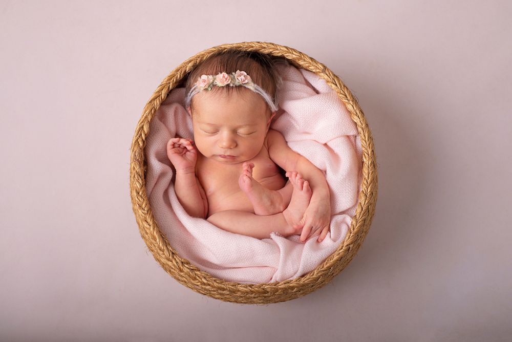 Newborn in basket prop, in studio posed newborn baby photography, Northumberland ON, Cobourg ON*