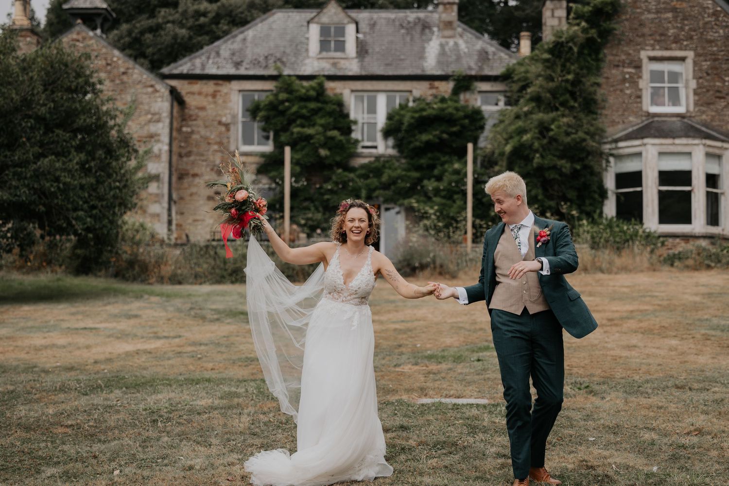 The Barn at Pengelly Wedding by Cornwall Wedding Photographer, Rabbit House Studio Photography. Bride and groom overlooking lake