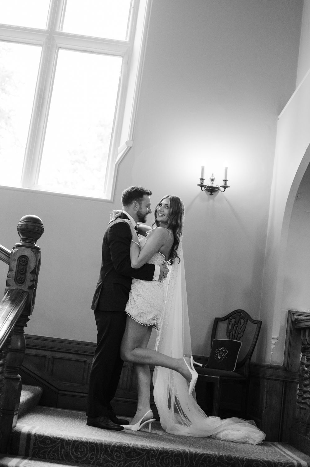 A sequence of black and white wedding photos showing a couple in a church interior moving from left to right.