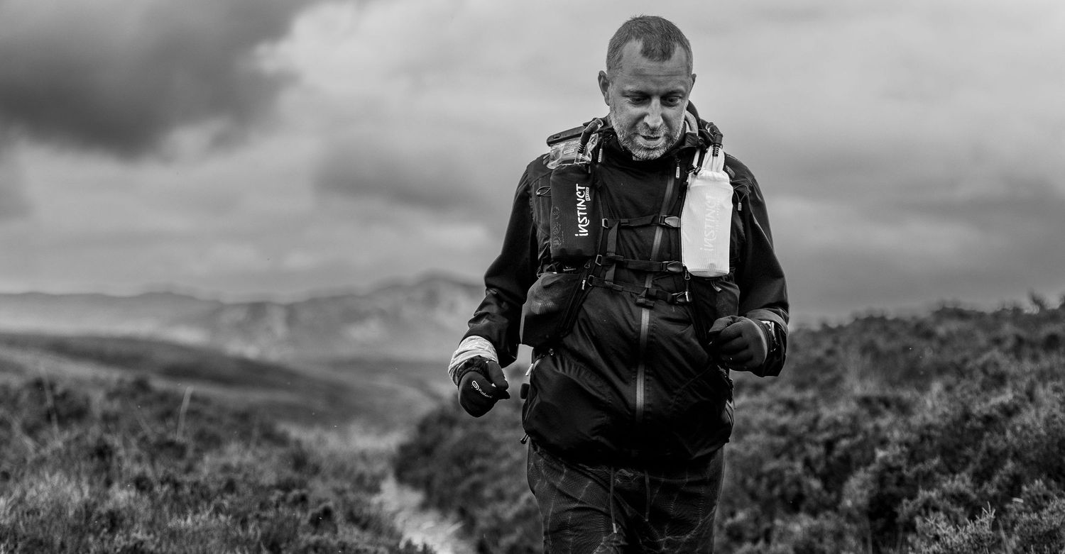 Andrew Paylor racing the Skye Trail Ultra, black and white action shot