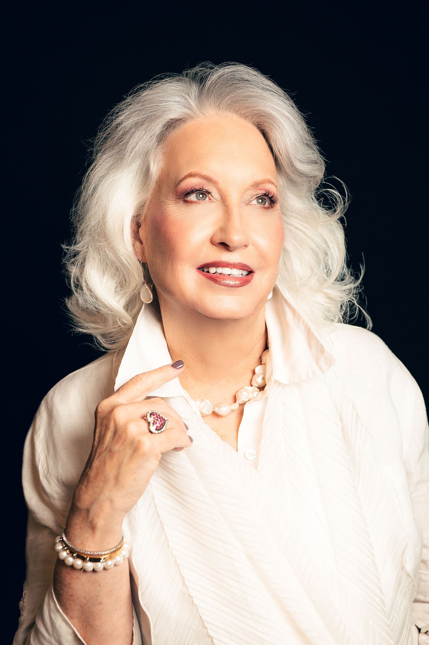 Portrait of a woman in her 70's for a 40 over 40 photoshoot in Utah, Creative portraits photographed by Carl James Photography.