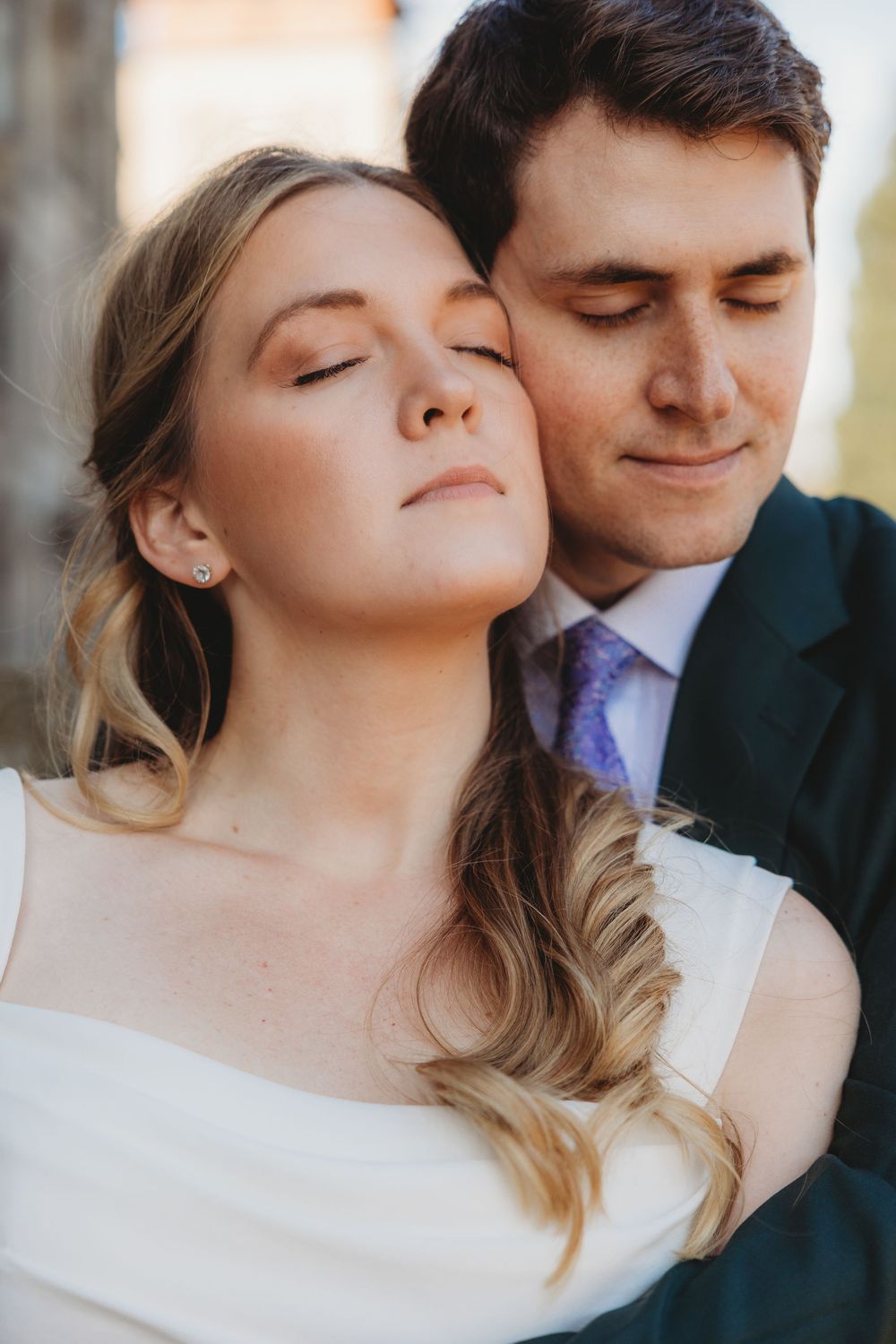 A romantic couple in formal attire share intimate moments in a series of close-up portrait photographs.