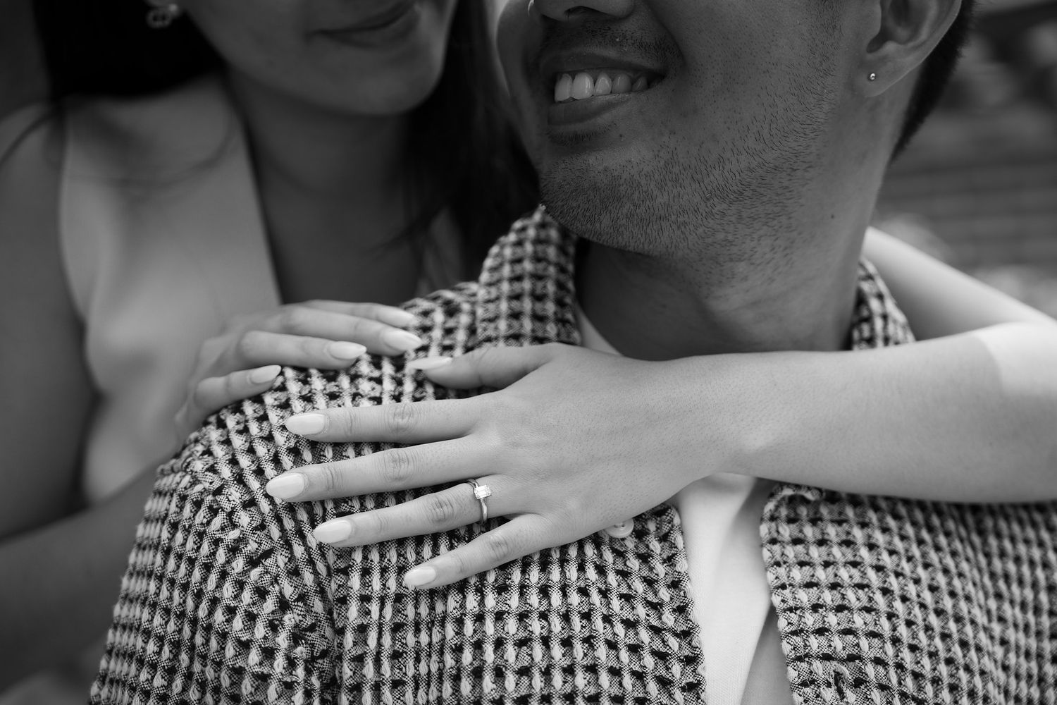 A sequence of black and white photos showing hands adjusting a checkered shirt collar.