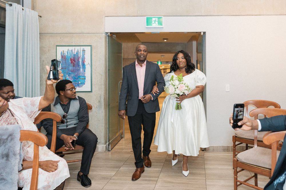 Multiple shots of a couple in wedding attire posing in an elegant indoor hallway setting.