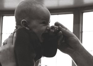 A black and white photo sequence showing a person drinking from a glass in progressive steps.