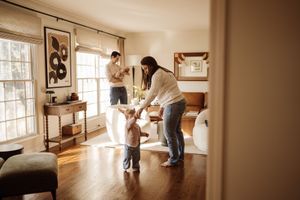 A family interacting during a lifestyle family photoshoot in Barrington