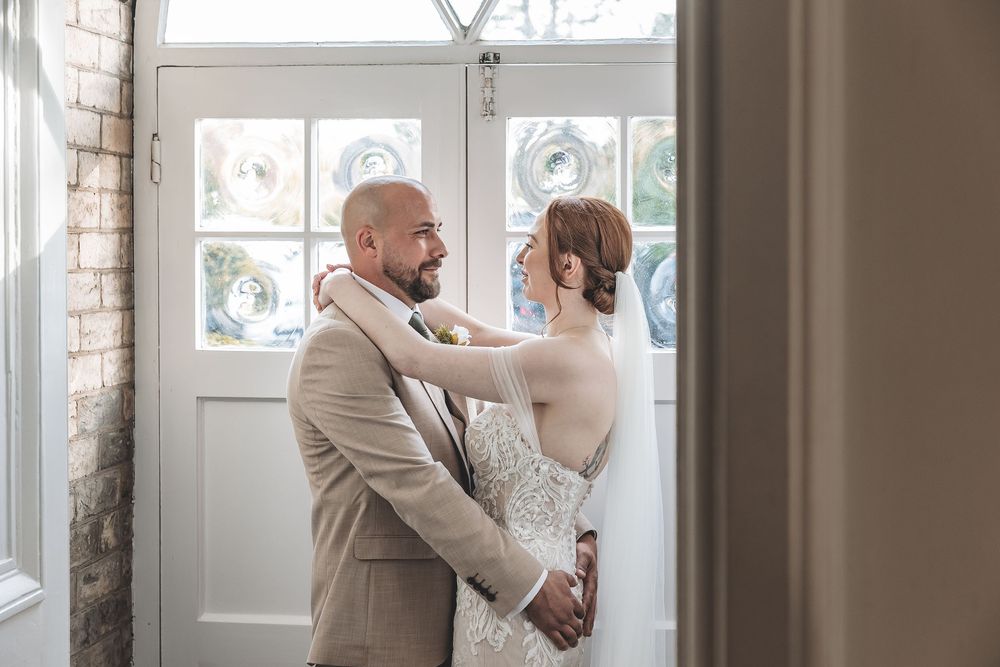 Relaxed wedding photography of couple sharing a quiet moment on their wedding day.